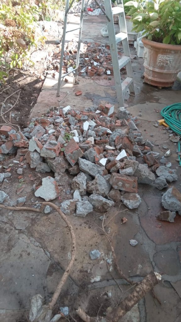 Pile of broken bricks and rubble on a Cape Town property waiting for removal