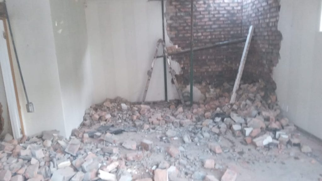 Rubble from an internal wall being taken down inside a Cape Town home