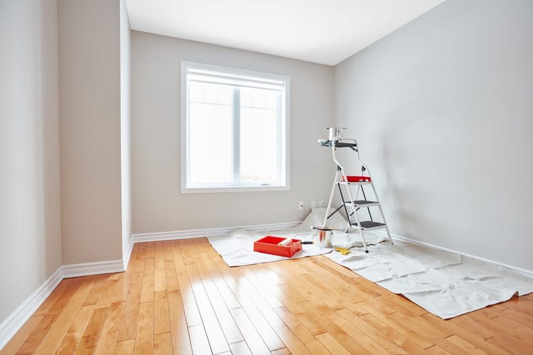 Empty room prepared for painting with tools in Cape Town