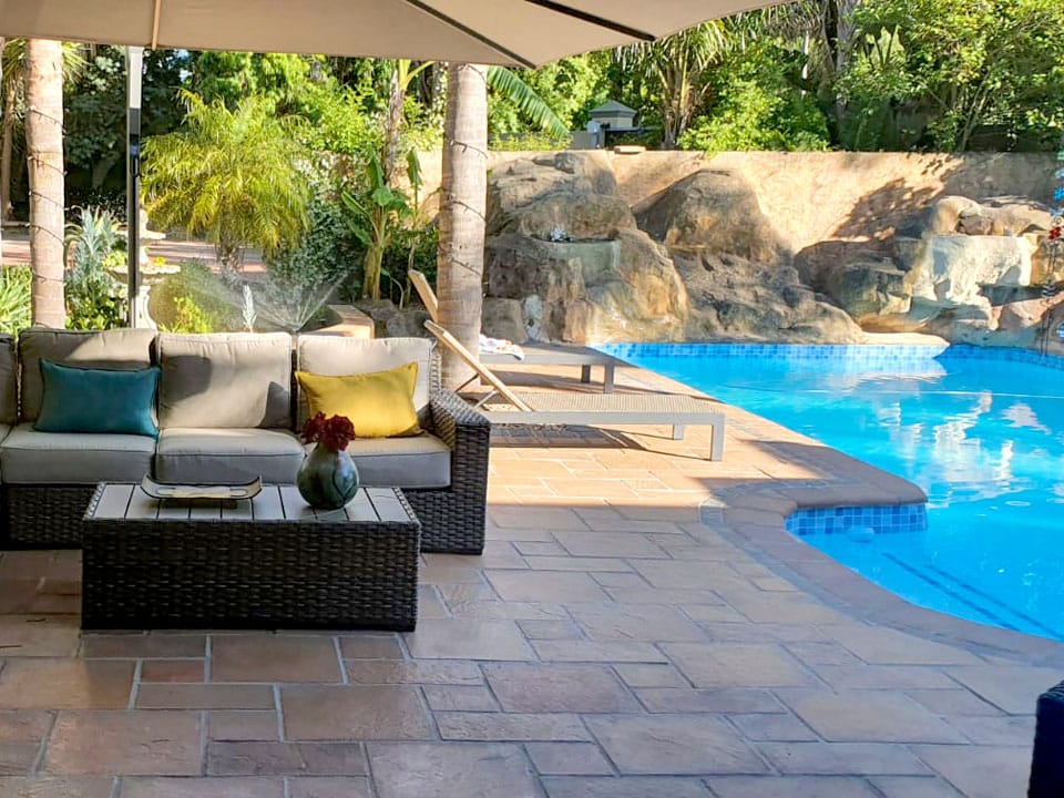 Paving laid around a swimming pool in Cape Town