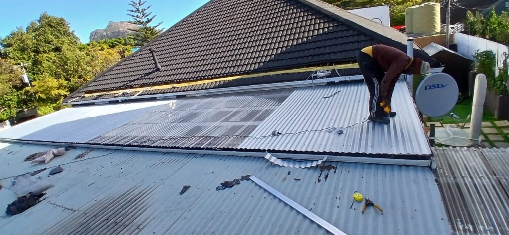 Metal roof with solar panels viewed from above