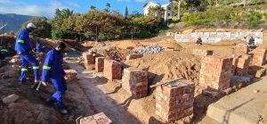Builders laying foundation brickwork in Cape Town