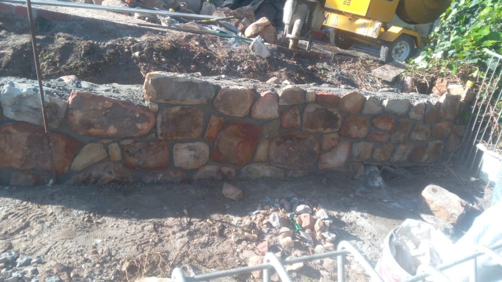 Constructing a stone retaining wall in Cape Town