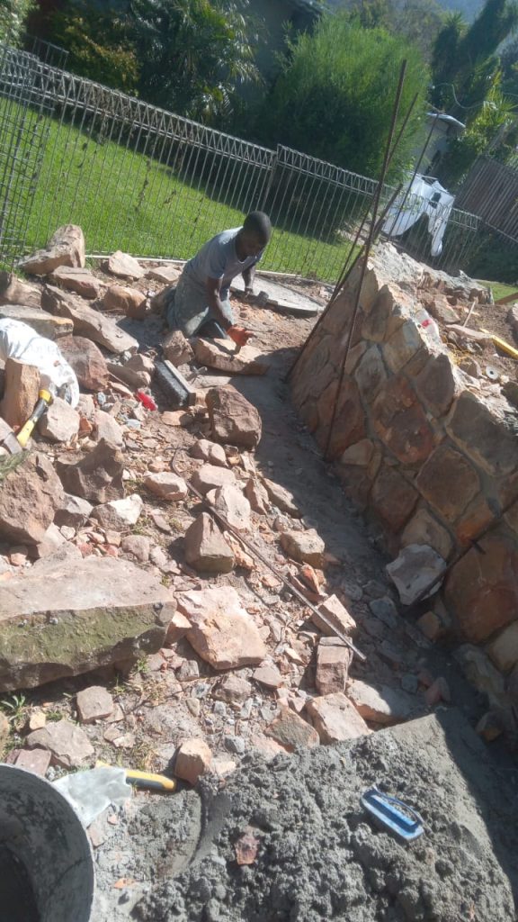 Stone wall with groundwork in progress in Cape Town