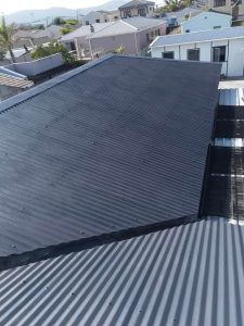 Freshly coated charcoal IBR roof on a Cape Town property