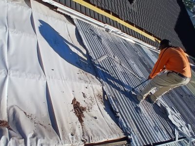 Roof protected with sheeting during repair work